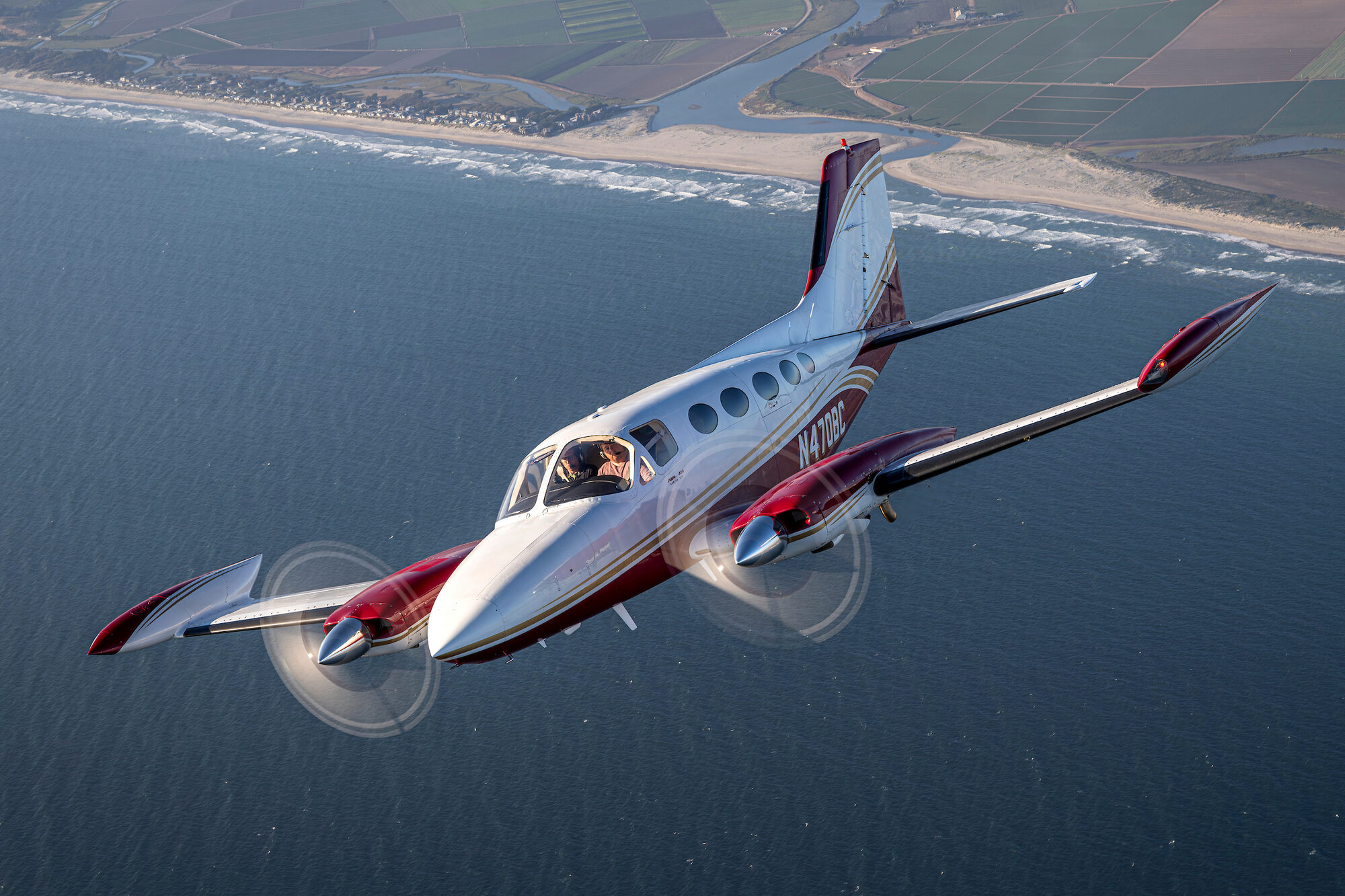 Cessna 414 Chancellor in flight over the California coast